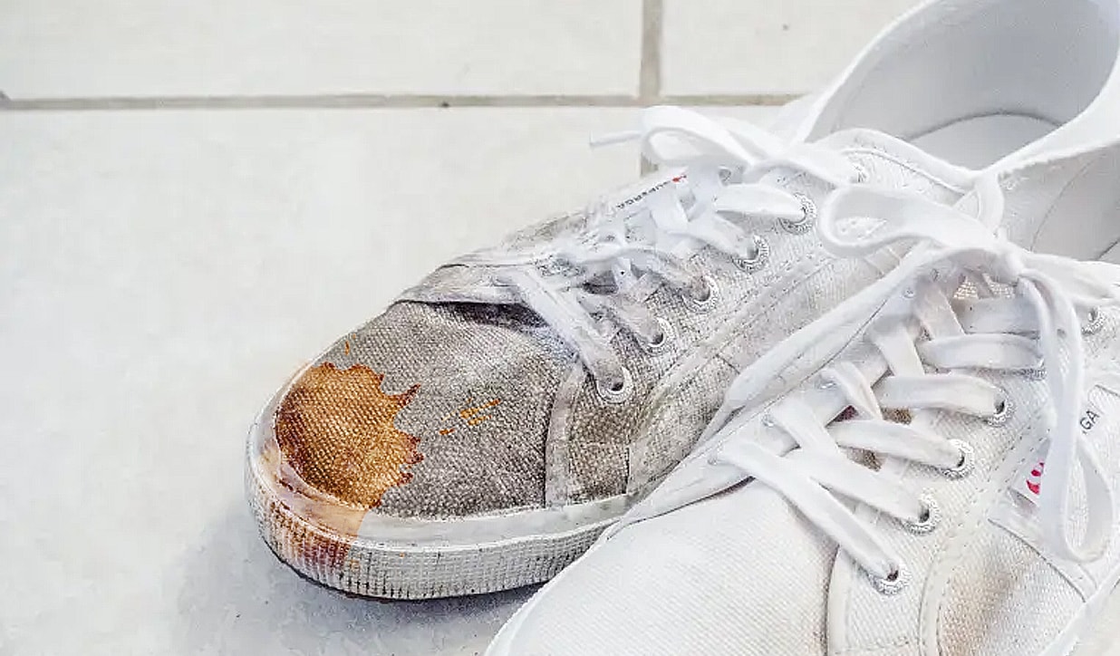 Treat the stain before you clean the canvas shoe