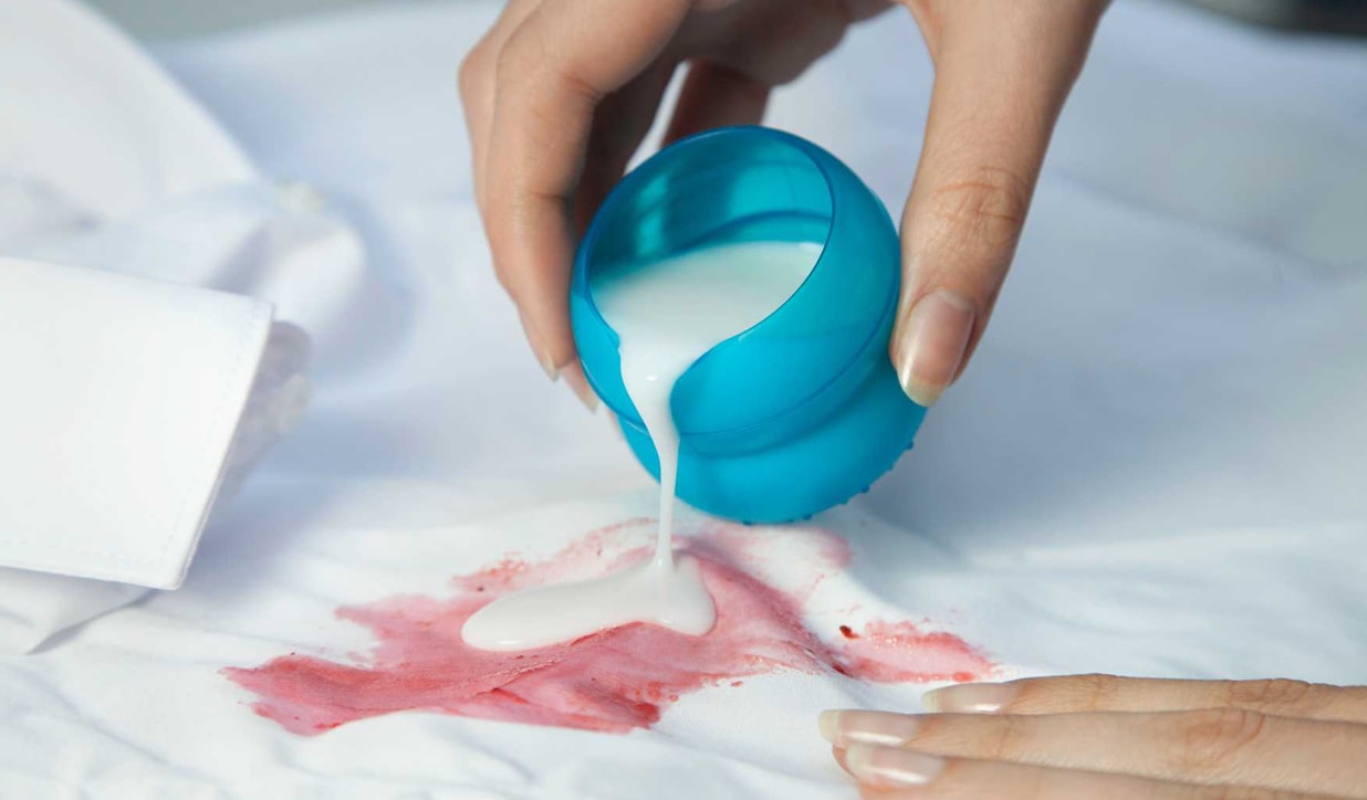 Removing stains from a white shirt using a commercial stain remover